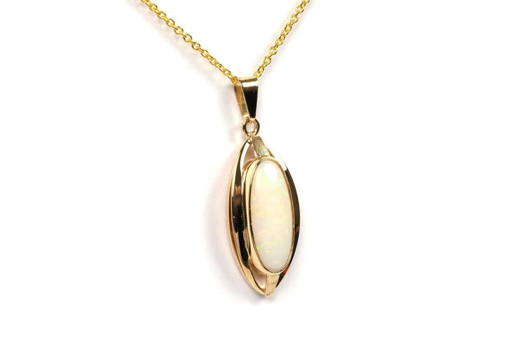 Pendentif Pendentif années 70 en or jaune 18 carats serti d’une opale 58 Facettes 21735