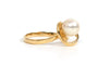 Bague 51 Bague années 70 en or jaune 18 carats sertie d’une perle 58 Facettes 21857