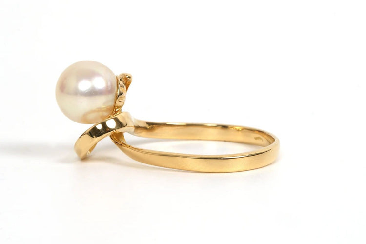 Bague 51 Bague années 70 en or jaune 18 carats sertie d’une perle 58 Facettes 21857