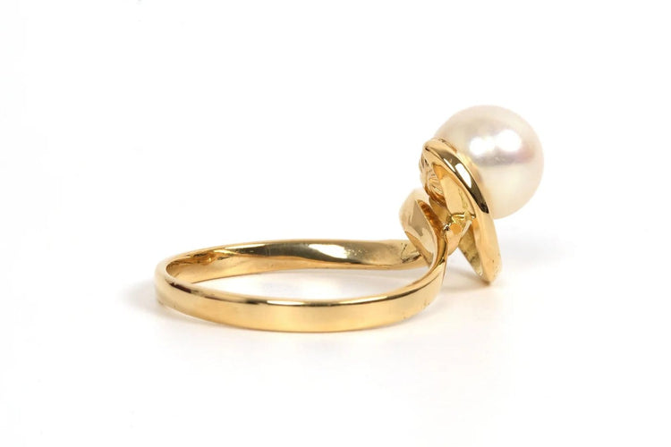 Bague 51 Bague années 70 en or jaune 18 carats sertie d’une perle 58 Facettes 21857