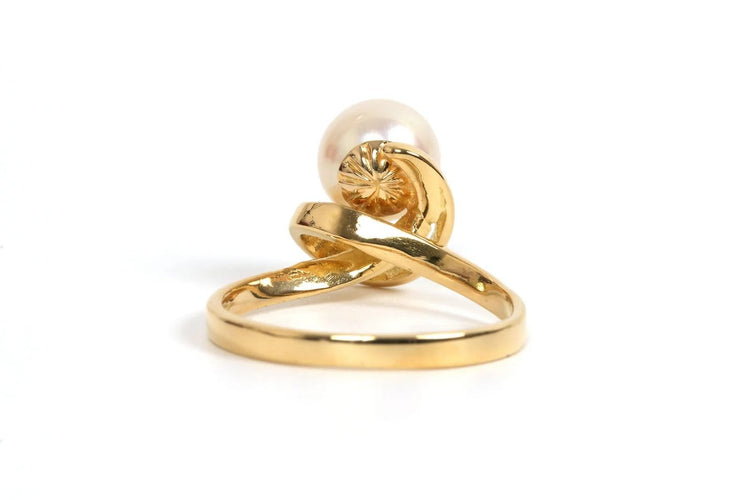 Bague 51 Bague années 70 en or jaune 18 carats sertie d’une perle 58 Facettes 21857