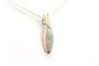 Pendentif Pendentif années 70 en or jaune 18 carats serti d’une opale 58 Facettes 20173