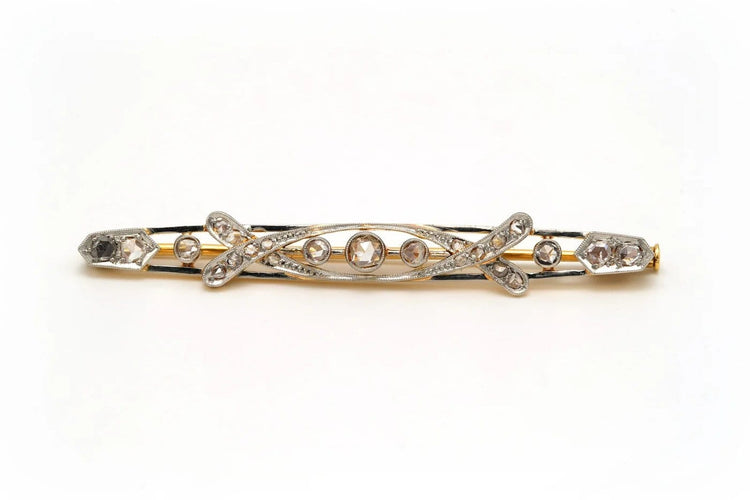 Broche Broche Art déco sertie de diamants en or blanc et jaune 18 carats 58 Facettes 20675