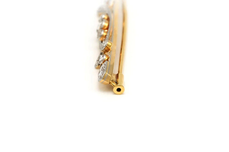 Broche Broche Art déco sertie de diamants en or blanc et jaune 18 carats 58 Facettes 20675
