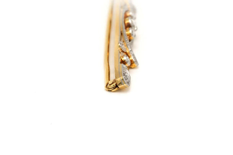 Broche Broche Art déco sertie de diamants en or blanc et jaune 18 carats 58 Facettes 20675