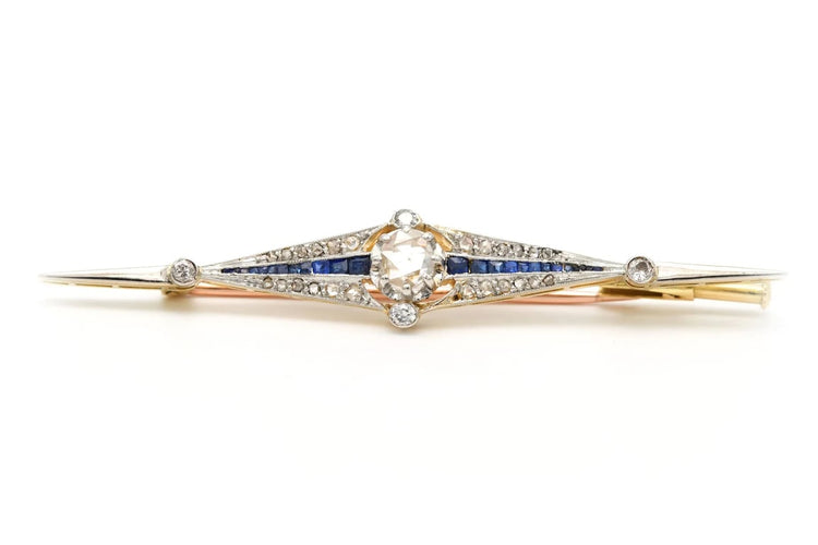Broche Broche Art Déco en or blanc et jaune 18 carats, saphirs et diamants 58 Facettes 22395