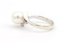 Bague 52 Bague années 70 en or blanc 18 carats avec perle et diamants 58 Facettes 19113
