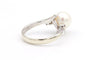 Bague 52 Bague années 70 en or blanc 18 carats avec perle et diamants 58 Facettes 19113