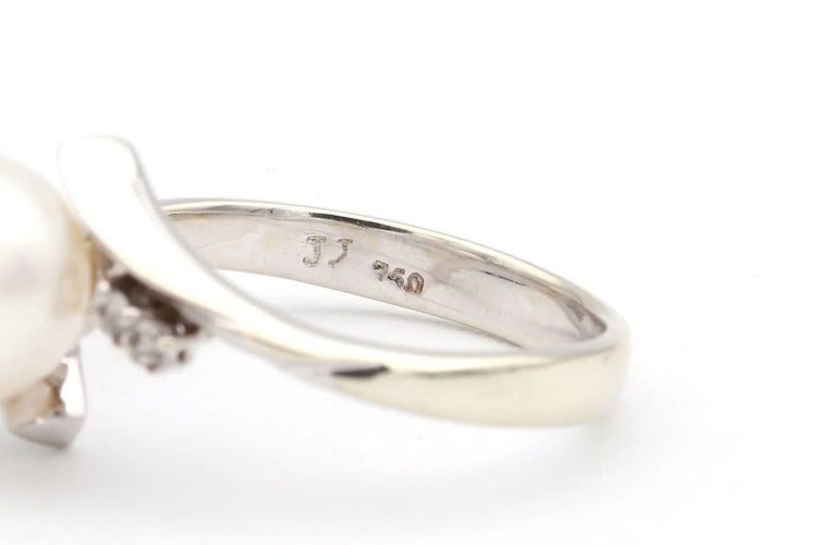 Bague 52 Bague années 70 en or blanc 18 carats avec perle et diamants 58 Facettes 19113