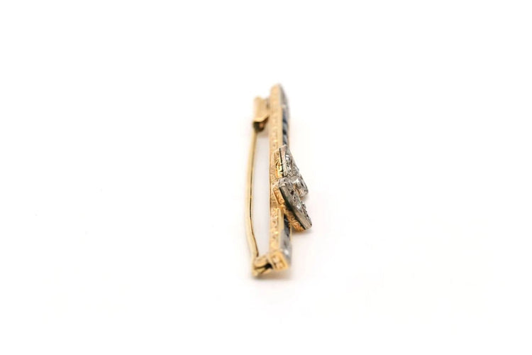 Broche Broche Art Déco en or jaune et blanc 18 carats, saphirs et diamants 58 Facettes 22536