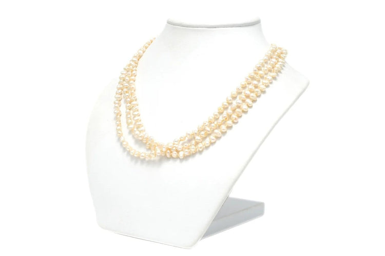 Collier Collier années 70 en or blanc 18 carats, perles et rubis 58 Facettes 22056