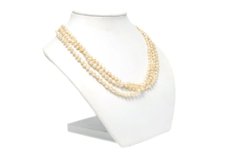 Collier Collier années 70 en or blanc 18 carats, perles et rubis 58 Facettes 22056