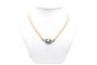 Collier Collier années 70 en or blanc 18 carats, émeraudes et perles 58 Facettes 22636