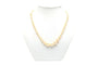 Collier Collier années 70 en or blanc 18 carats, émeraudes et perles 58 Facettes 22636
