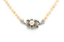 Collier Collier années 70 en or blanc 18 carats, émeraudes et perles 58 Facettes 22636