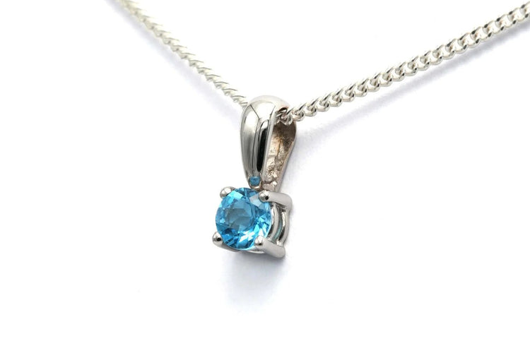 Pendentif Pendentif contemporain en or blanc 18 carats serti d’une topaze 58 Facettes 22888