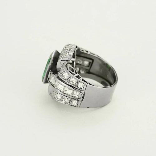 Bague 52 Bague Art déco en platine et or jaune, diamants et émeraude 58 Facettes