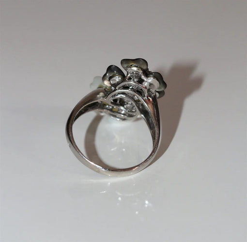Bague 65 Bague double fleur en or blanc 18 k, diamants et nacre 58 Facettes 480