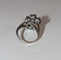 Bague 65 Bague double fleur en or blanc 18 k, diamants et nacre 58 Facettes 480
