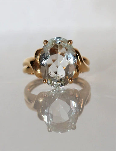 Bague 54 Bague en or jaune 18k sertie d’une aigue-marine ovale 4,93 ct 58 Facettes 515