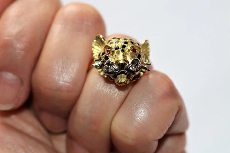 Bague 60 Bague Panthère en or jaune 18k, émail, brillants et rubis 58 Facettes 329