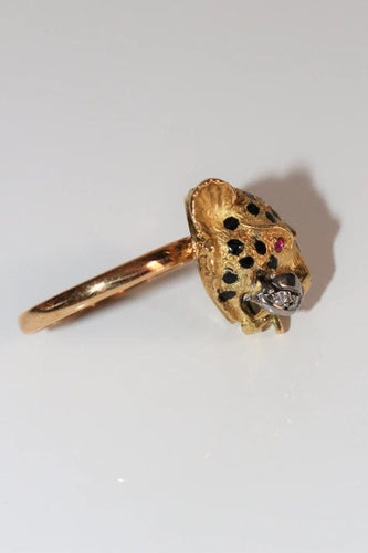 Bague 60 Bague panthère en or jaune 18 carats, émail, diamants et rubis 58 Facettes 329