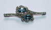 Broche Broche rétro en or gris 18 carats, aigues-marines et diamants 58 Facettes 580