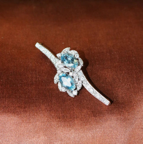Broche Broche rétro en or gris 18 carats, aigues-marines et diamants 58 Facettes 580