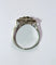 Bague 56 Bague Art déco hexagonale en or blanc et platine, diamants et saphirs 58 Facettes 156