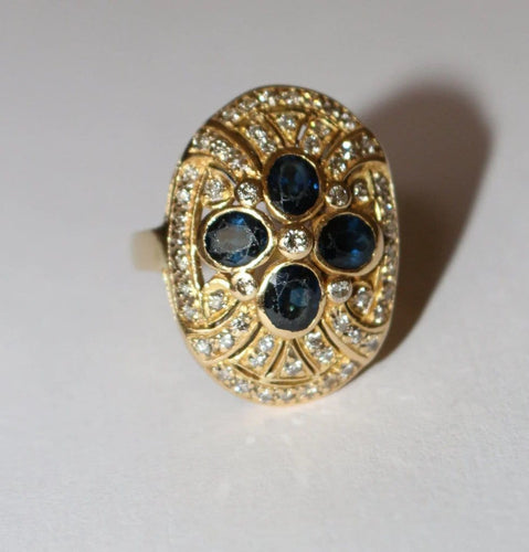 Bague 52 Bague ovale en or jaune 18 carats, saphirs et diamants 58 Facettes 587
