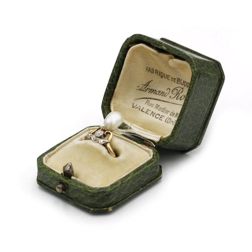 Bague 51 Bague en or jaune 750‰ avec perle et diamants 58 Facettes 1033