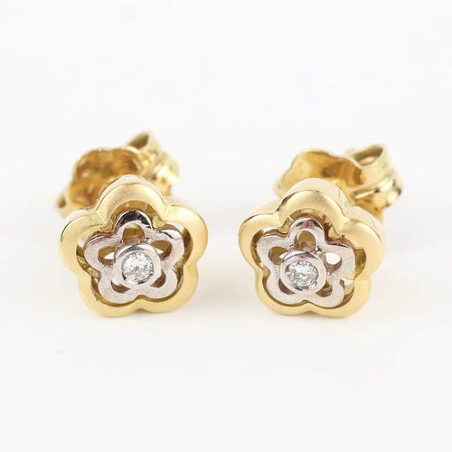 Boucles d'oreilles Boucles d'oreilles fleur en or jaune et blanc 18 carats et diamants 58 Facettes 131208