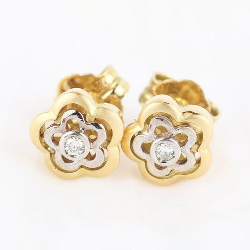 Boucles d'oreilles Boucles d'oreilles fleur en or jaune et blanc 18 carats et diamants 58 Facettes 131208