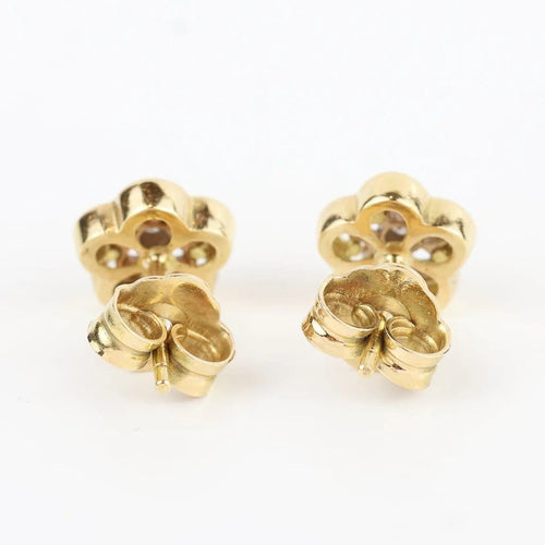 Boucles d'oreilles Boucles d'oreilles fleur en or jaune et blanc 18 carats et diamants 58 Facettes 131208