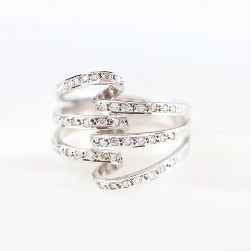 Bague 60 Bague vintage en or blanc 18 carats sertie de diamants 58 Facettes 131366D