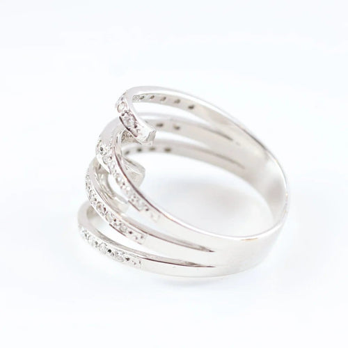 Bague 60 Bague vintage en or blanc 18 carats sertie de diamants 58 Facettes 131366D