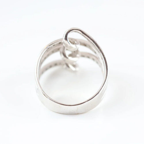 Bague 60 Bague vintage en or blanc 18 carats sertie de diamants 58 Facettes 131366D