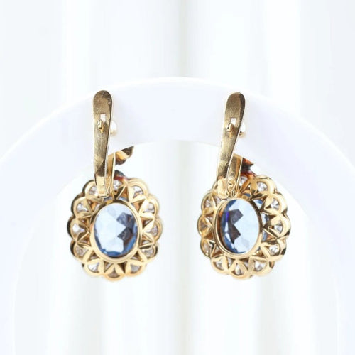 Boucles d'oreilles Boucles d'oreilles vintage à motif floral en or jaune 18 carats et diamants 58 Facettes J00003070