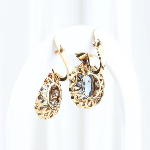 Boucles d'oreilles Boucles d'oreilles vintage à motif floral en or jaune 18 carats et diamants 58 Facettes J00003070