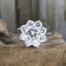 Bague Bague rosette en or blanc 18 carats avec diamants 58 Facettes 136043