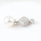 Pendentif Pendentif en or blanc 18 carats, diamants naturels et perle australienne 58 Facettes