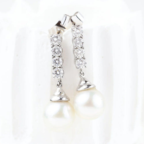 Boucles d'oreilles Boucles d'oreilles en or blanc 18 carats, diamants et perles 58 Facettes