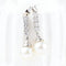 Boucles d'oreilles Boucles d'oreilles en or blanc 18 carats, diamants et perles 58 Facettes