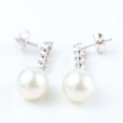 Boucles d'oreilles Boucles d'oreilles en or blanc 18 carats, diamants et perles 58 Facettes