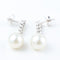 Boucles d'oreilles Boucles d'oreilles en or blanc 18 carats, diamants et perles 58 Facettes