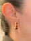 Boucles d'oreilles Pomellato Iconica - Boucles d'oreilles en or rose et grenats 58 Facettes