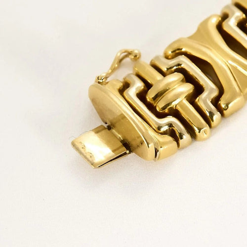 Bracelet Bracelet souple articulé à maillons godronnés en or jaune et or gris 18k 58 Facettes PL07