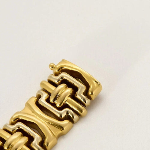 Bracelet Bracelet souple articulé à maillons godronnés en or jaune et or gris 18k 58 Facettes PL07