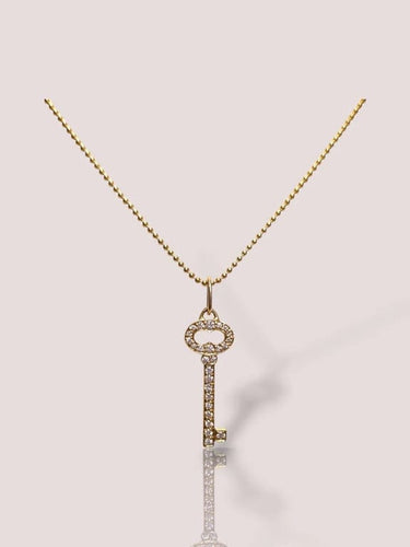 Collier Tiffany & Co - Collier porte-clés en or jaune 18 carats et diamants 58 Facettes 85572