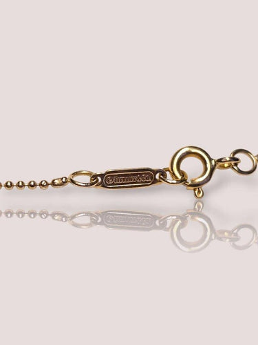 Collier Tiffany & Co - Collier porte-clés en or jaune 18 carats et diamants 58 Facettes 85572